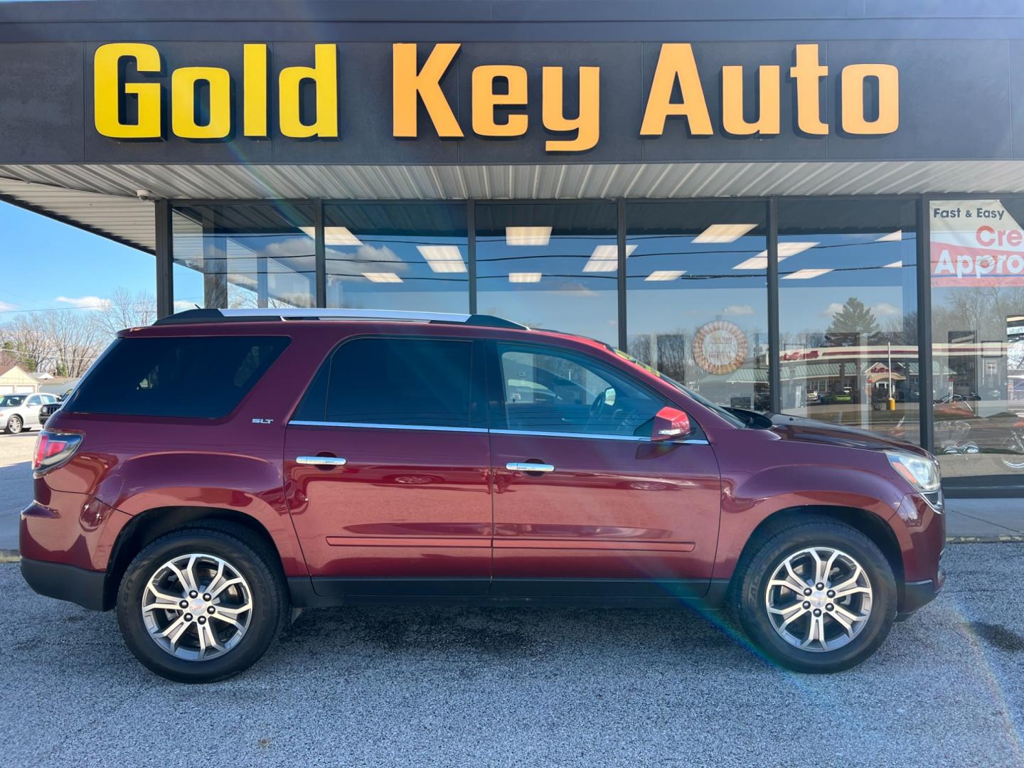 2016 Crimson Red Tintcoat GMC Acadia SLT-1 FWD (1GKKRRKD9GJ) with an 3.6L V6 DOHC 24V engine, 6-Speed Automatic transmission, located at 1633 W Kimberly, Davenport, IA, 52806, (563) 323-5341, 41.559456, -90.598732 - Photo#0